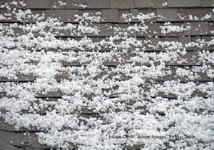 hail that has fallen and settled on a rooftop