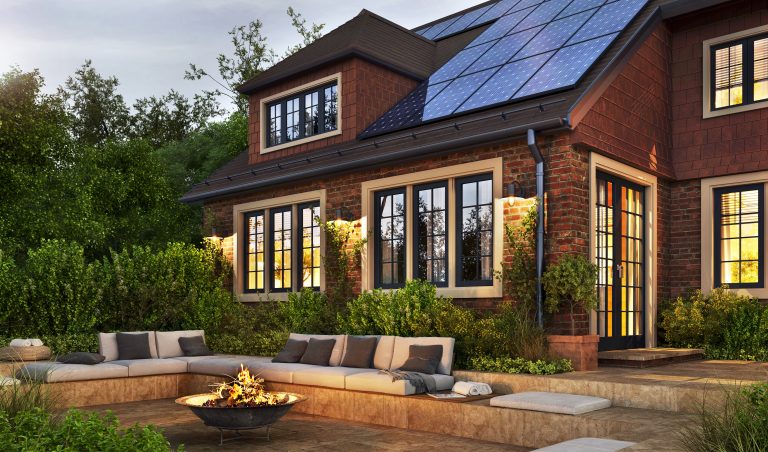 Energy-efficient roofing with rooftop solar panels on a home in Cedar Park, TX, complementing services by Longhorn Roofing.