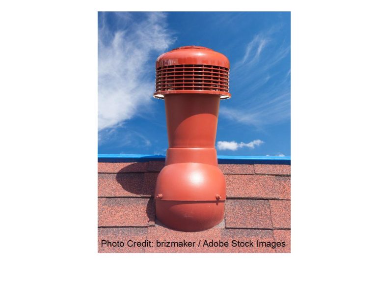 A red roof ventilation pipe with a domed cap sits atop asphalt shingles under a bright blue sky with wispy clouds.